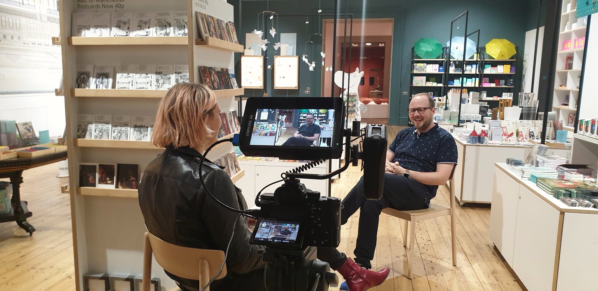customer journey Woman interviewing man on camera
