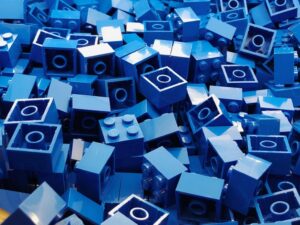 A pile of blue lego bricks